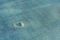 fabric ripped hole classic denim jeans close up texture Royalty Free Stock Photo