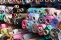 Fabric rolls at market stall , textile industry background Royalty Free Stock Photo