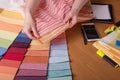 Fabric samples on table, selection of colour Royalty Free Stock Photo