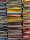 Fabrics of different colors and textures are laid horizontally. Royalty Free Stock Photo