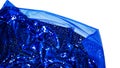 Fabric with sequins on a white background. Glitter texture. Sparkling color blue