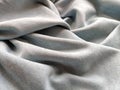 Fabric sheer curtain fabric. Beautiful gray-blue color. Soft velvet with a pile. The curtain material is carelessly folded and