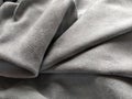 Fabric sheer curtain fabric. Beautiful gray-blue color. Soft velvet with a pile. The curtain material is carelessly folded and