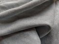 Fabric sheer curtain fabric. Beautiful gray-blue color. Soft velvet with a pile. The curtain material is carelessly folded and