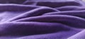 Fabric sheer curtain fabric. Beautiful violet color. Soft velvet with a pile. The curtain material is carelessly folded and