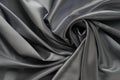 Fabric silk satin texture background black silber color. Royalty Free Stock Photo