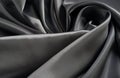 Fabric silk satin texture background black silber color. Royalty Free Stock Photo