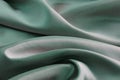 Fabric silk satin texture background green silber color. Royalty Free Stock Photo