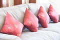 Fabric sofa with red pillows Royalty Free Stock Photo