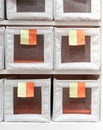 Fabric storage boxes in square shape with orange and yellow pull