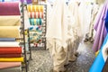 fabric store with stacks of colorful textiles