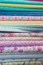 Fabric store with stacks of colorful textiles Royalty Free Stock Photo