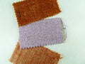 Fabric swatches in warm tones Royalty Free Stock Photo