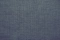 Fabric texture background. Gray fabric with weave. Natural slightly wrinkled look of the material. Uniform copy space Royalty Free Stock Photo