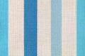 Fabric texture canvas. Cotton background. Detail close up for dress or other modern fashion textile print. Blue and gray striped