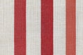 Fabric texture canvas. Cotton background. Detail close up for dress or other modern fashion textile print. Red and gray striped Royalty Free Stock Photo