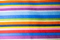 Fabric texture with multi-colored stripes. Rainbow fabric texture Royalty Free Stock Photo