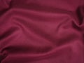 Fabric texture of natural cotton, wool, silk or linen textile material. Red fabric background Royalty Free Stock Photo