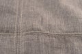 Fabric texture with seam stitch seam. Royalty Free Stock Photo
