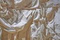 Fabric texture, soft, low-contrast, slightly toned conceptual image of white fabric prepared in plaster solution, low warm toning