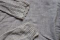 Fabric texture on two dirty gray wool sleeves Royalty Free Stock Photo