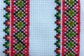 Fabric texture. Ukrainian ornament. Geometric pattern. Ukrainian culture. Handmade textile art. Bright national ornament.