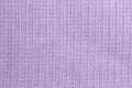 Fabric texture waffle towels in the cage, purple