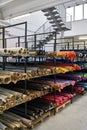 Fabric warehouse with many multicolored textile rolls