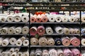 Fabric warehouse with many multicolored textile rolls