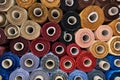 Fabric warehouse with many multicolored textile rolls