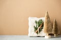 Fabric wrapped gifts, Zero waste beauty body care and house cleaning items and wooden Christmas decorations Royalty Free Stock Photo