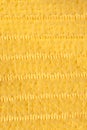 Fabric yellow striped background. Soft fiber texture polyester close-up