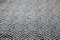 Fabric with zig- zag rows pattern on it