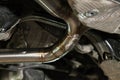 Fabrication and installation of a stainless steel car exhaust pipe with a bifurcation and a louder sound with a color weld under