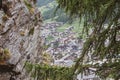 Fabulous alpine chalets, green fields, sheer cliff. Zermatt, Switzerland, Europe. Royalty Free Stock Photo