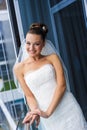 Fabulous bride near the window. Royalty Free Stock Photo