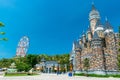 Fairy castle and Ferris wheel in an amusement park without people