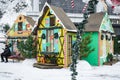 Fabulous colorful houses of the gnomes. Separate funny little constructions on a white background. Christmas and New Year theme.