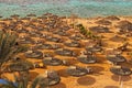 Fabulous landscape view of the beautiful beach with many umbrellas and clear water of the Red Sea