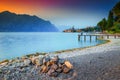 Fabulous Malcesine tourist resort with colorful sunset, Garda lake, Italy Royalty Free Stock Photo