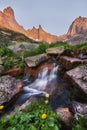 Fabulous mountain streams, lush greenery and flowers around. Thawed spring water from the mountains. Magical views of high Royalty Free Stock Photo