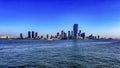 The fabulous skyline of New York, seen from a boat that has sailed to Liberty Island. Royalty Free Stock Photo
