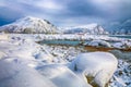 Fabulous snowy winter scene of  Valberg village with snowy  mountain peaks on Lofoten Islands Royalty Free Stock Photo