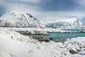 Fabulous snowy winter scene of  Valberg village with snowy  mountain peaks on Lofoten Islands Royalty Free Stock Photo