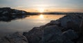 Fabulous sunset over the rocky shore of the North Sea in Norway