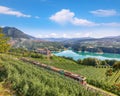 Fabulous View of the Cles Castel, the Santa Giustina Lake and lots of apple plantations Royalty Free Stock Photo