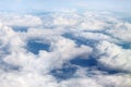 Fabulous, white clouds and blue sky. View from the airplane window