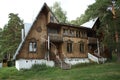 A fabulous wooden house stands in the forest