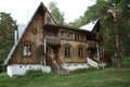 A fabulous wooden house stands in the forest