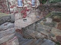 Fabulously beautiful old staircase of colored wild stone in Mason.